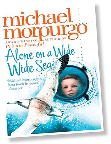 The cover to Michael Morpurgo's book "alone on a Wide Wide Sea". There is a boy looking at a seagull.
